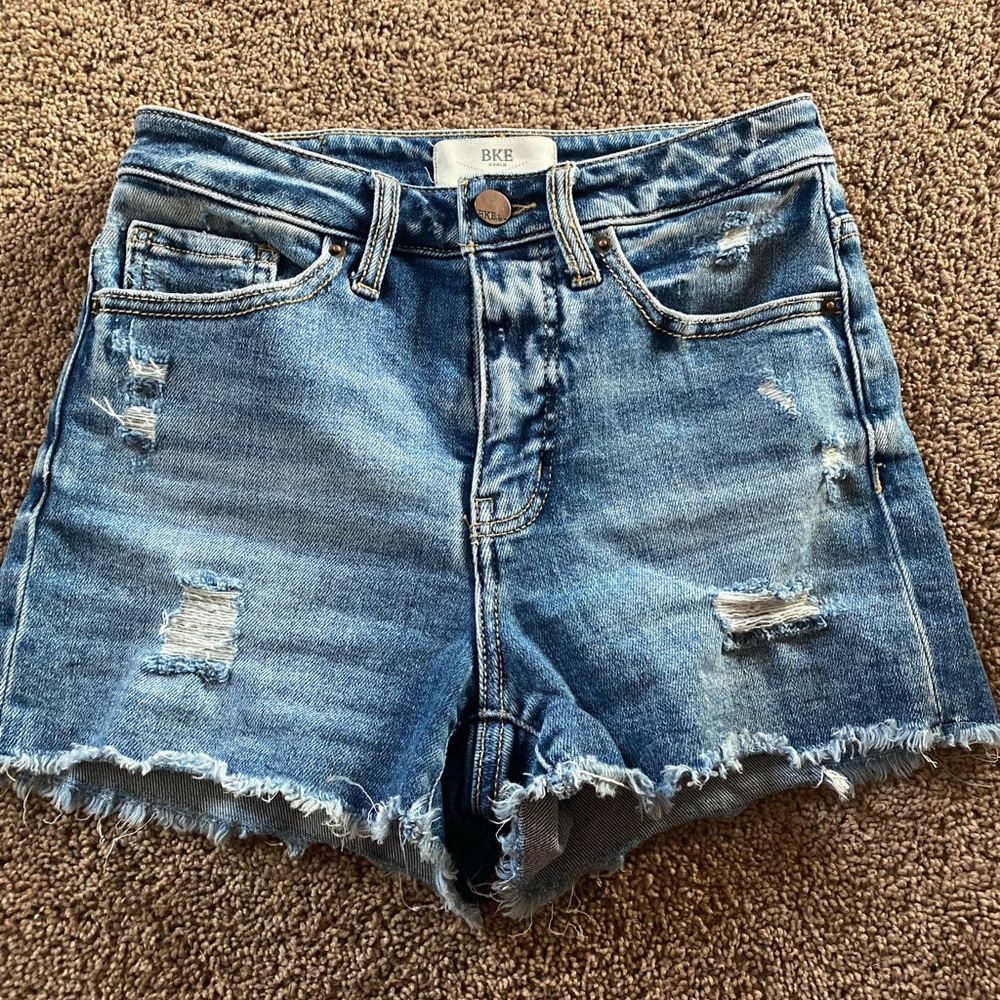 BKE Women's Distressed Denim Cutoff Shorts in Blue